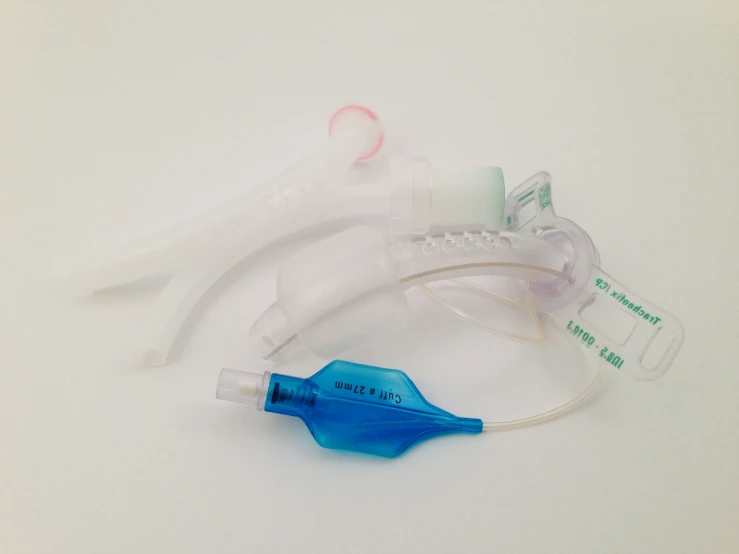 three plastic medical supplies, one for a nurse and two for a patient