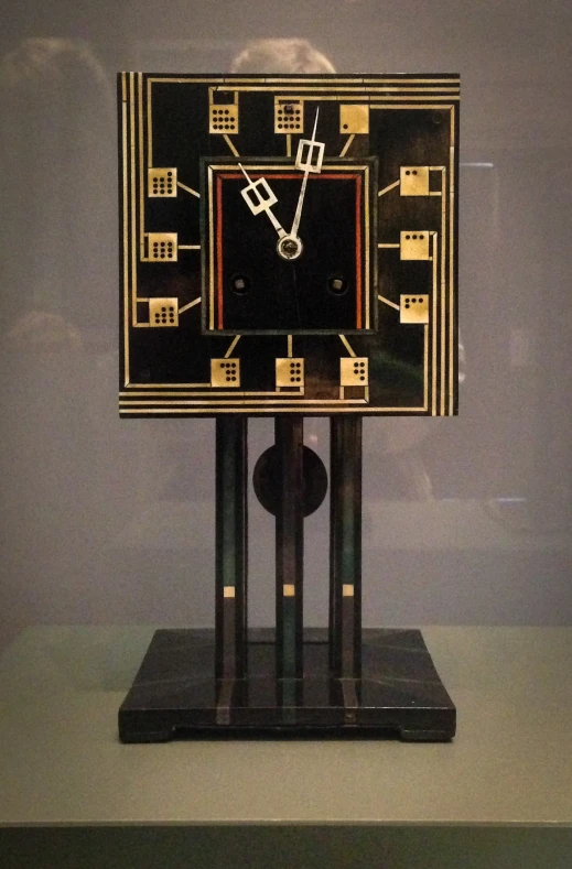 a clock on display with some kind of design
