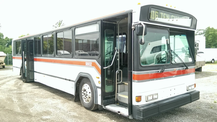 this is an image of a bus parked in the dirt