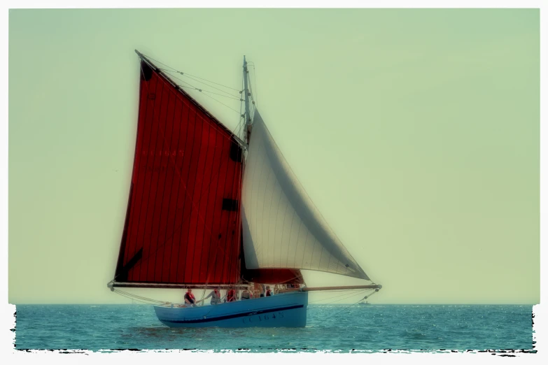 a small boat floating on top of the ocean