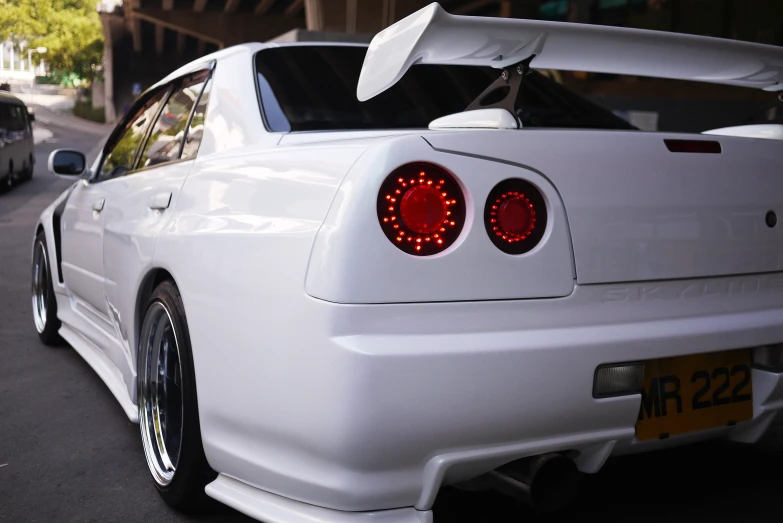 a close up of the back of a sports car