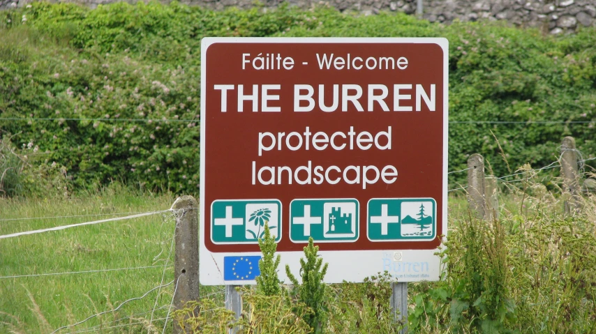 the welcome sign is posted at the entrance