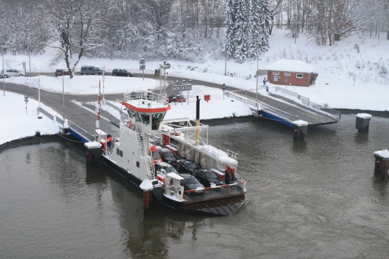 two boats that are sitting in the water