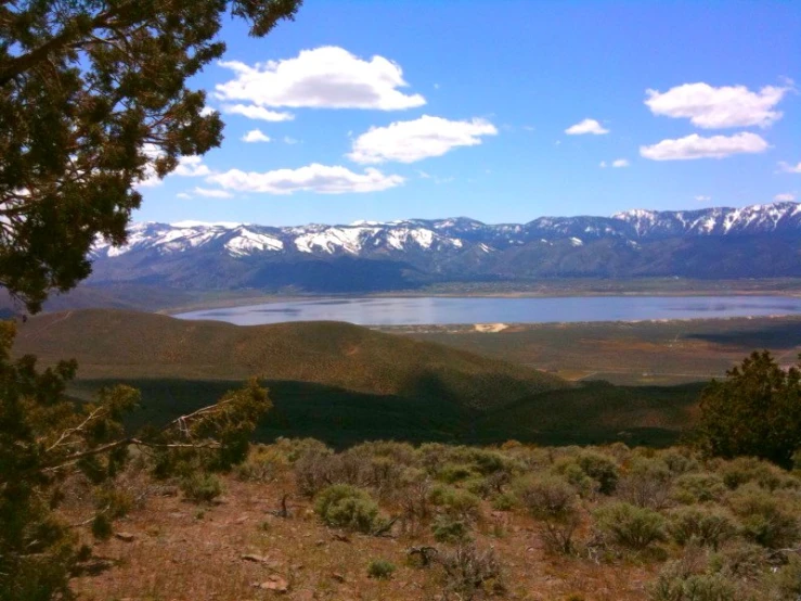 a view of a lake from a hill