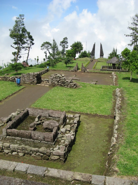 a landscape po with stone buildings and stone grass