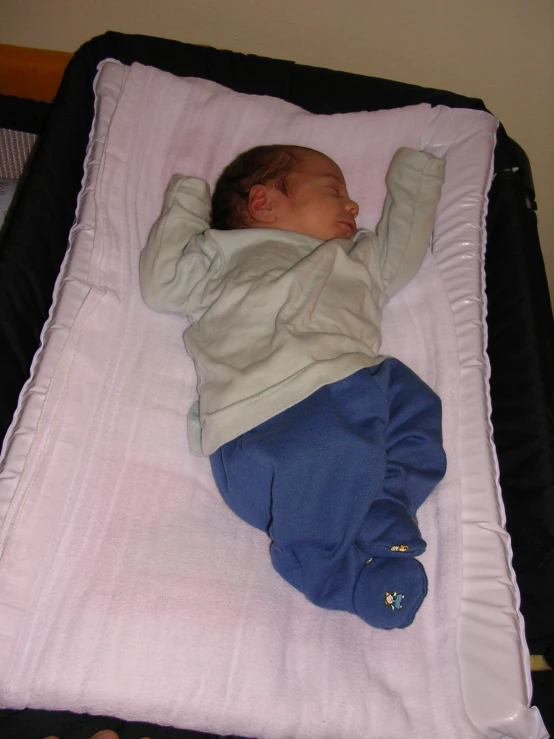 a sleeping baby in the shape of an infant