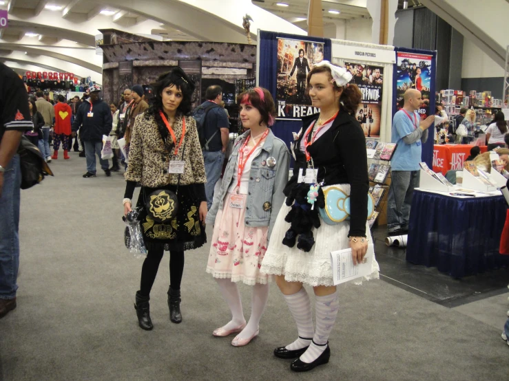 two women with weird hair and some very cute clothes