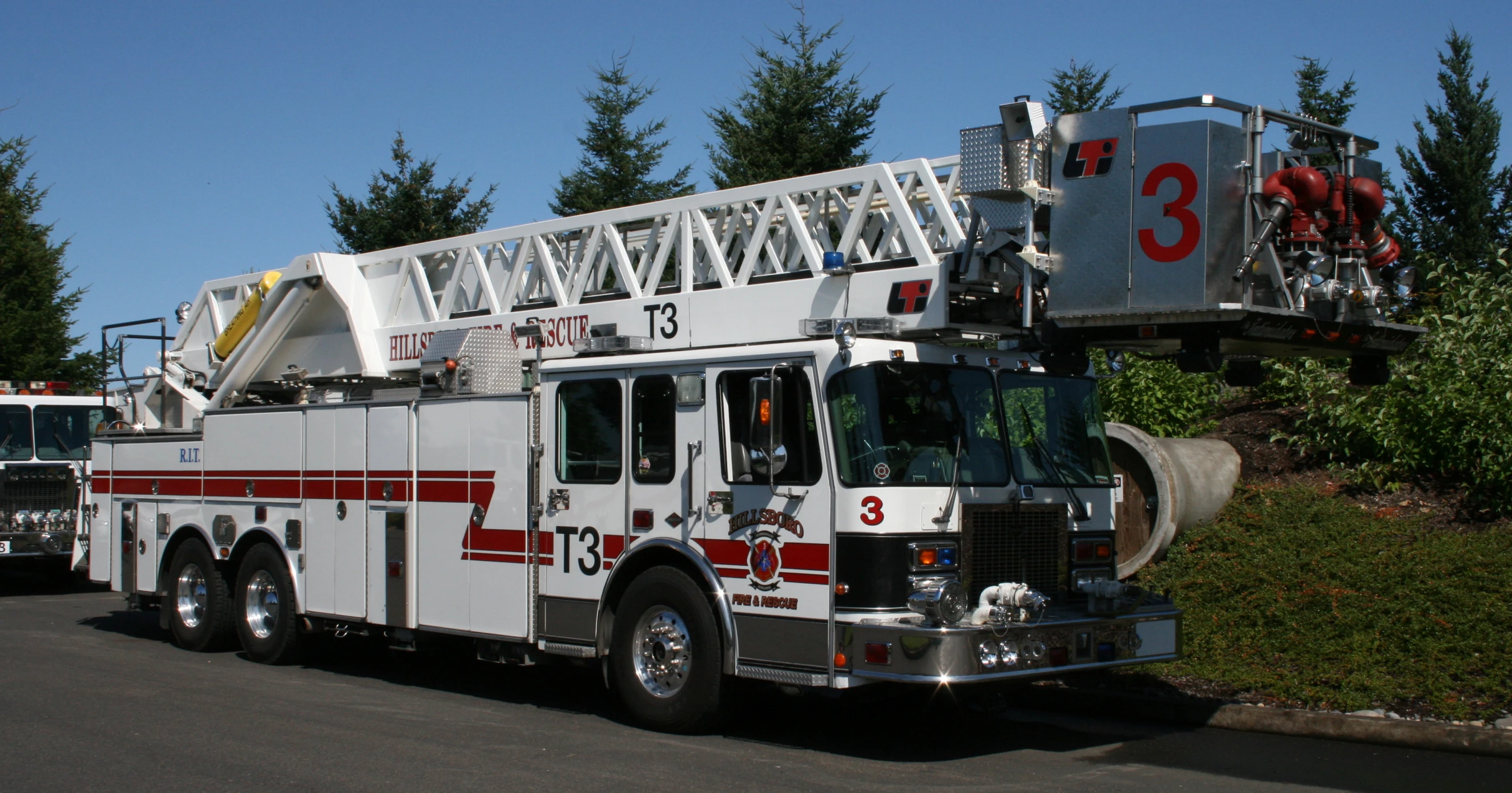 a fire truck is parked on the side of a street