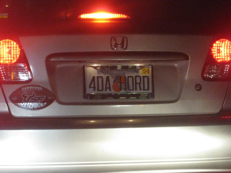 the license plate on the back of a car