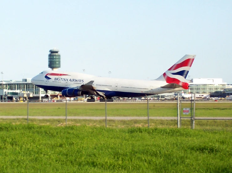 an airplane is on the runway at the airport