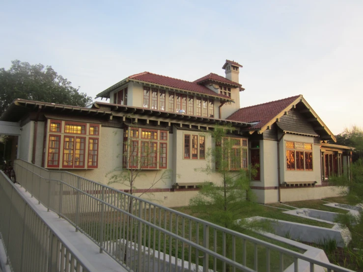 the outside of a home with large windows