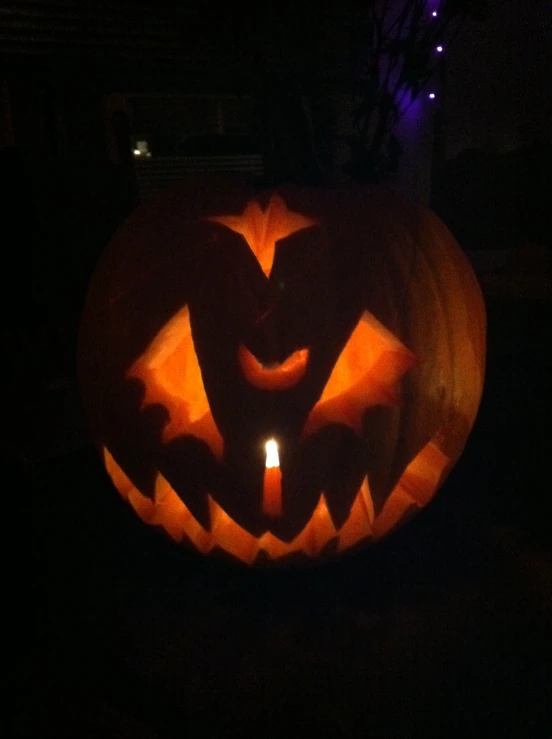 this is an intricate carved jack - o - lantern