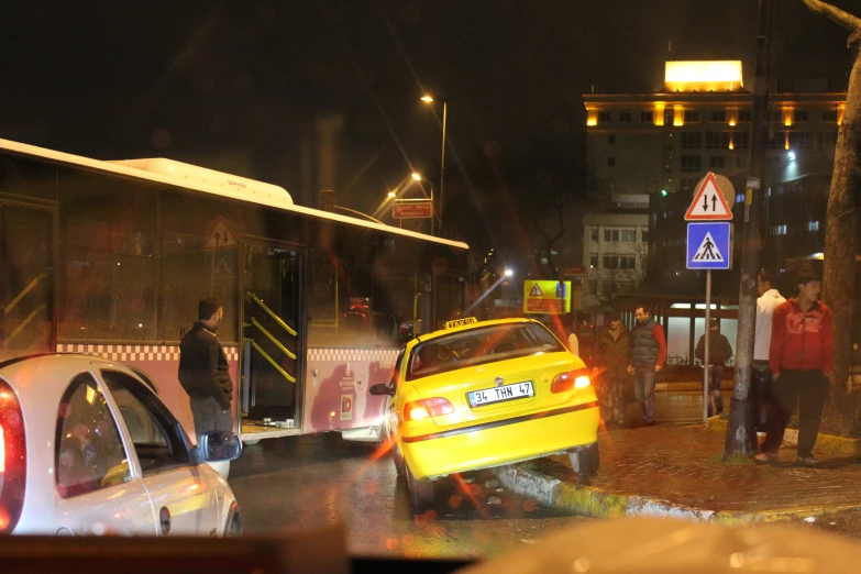 a traffic accident on a busy street at night