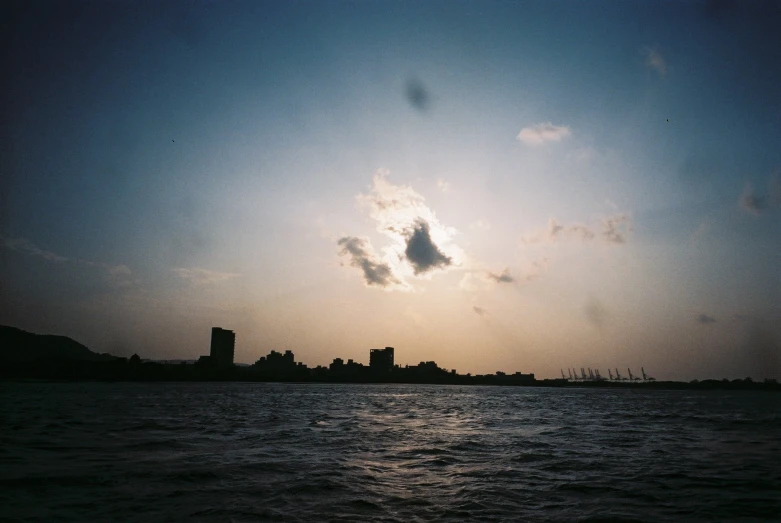 an airplane that is flying over the water