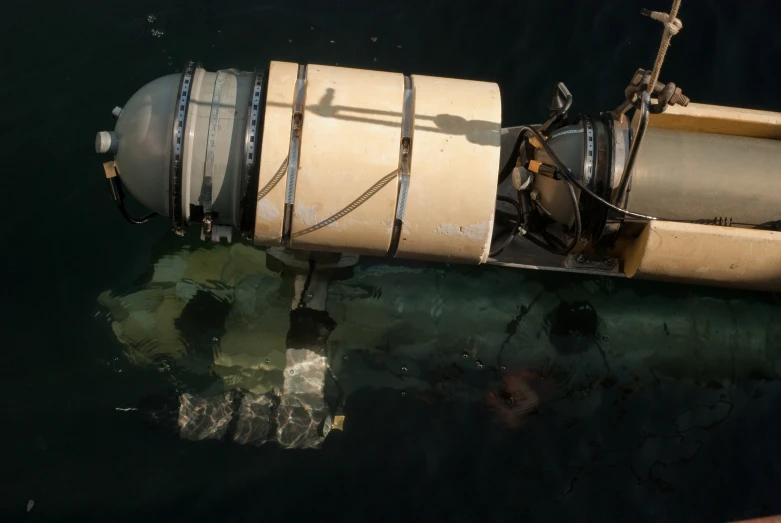 a buoy sitting on the top of a body of water