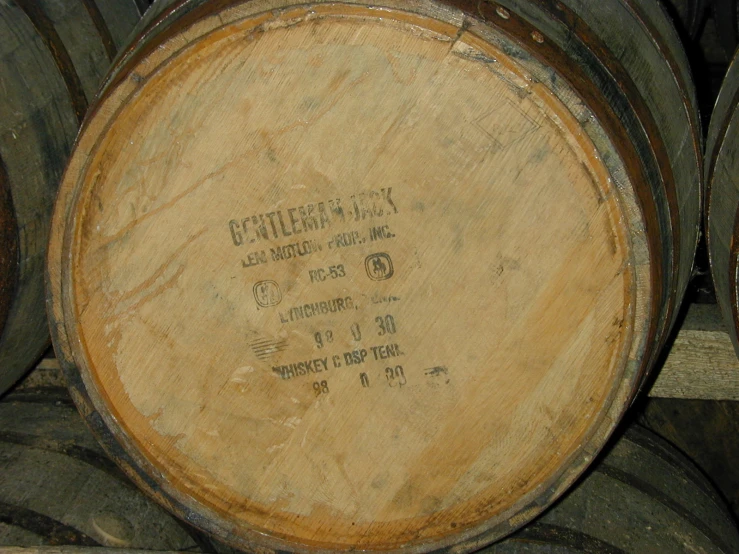 wooden wine barrels stacked on each other