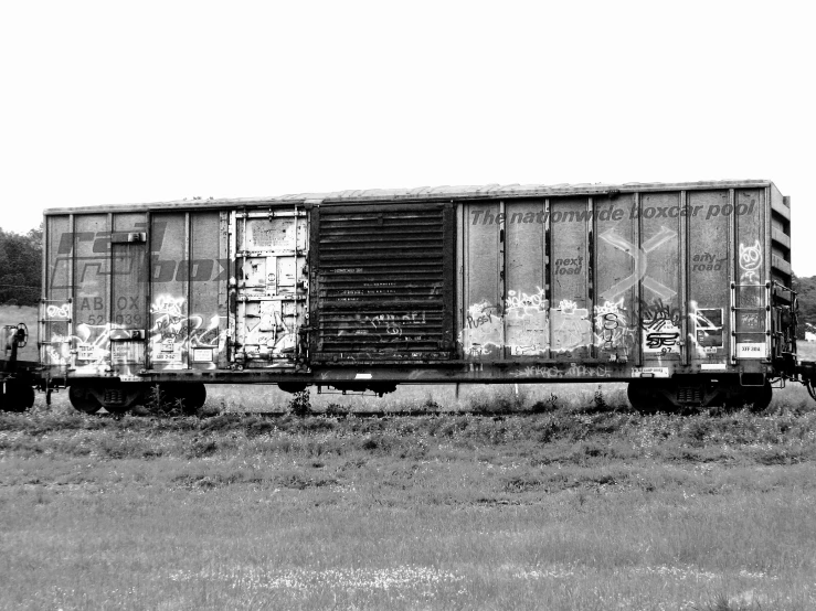 this is a black and white po of a large cargo train