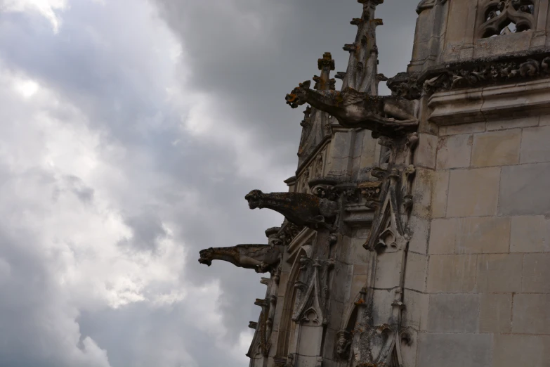 the statues are very tall and unique with architectural style