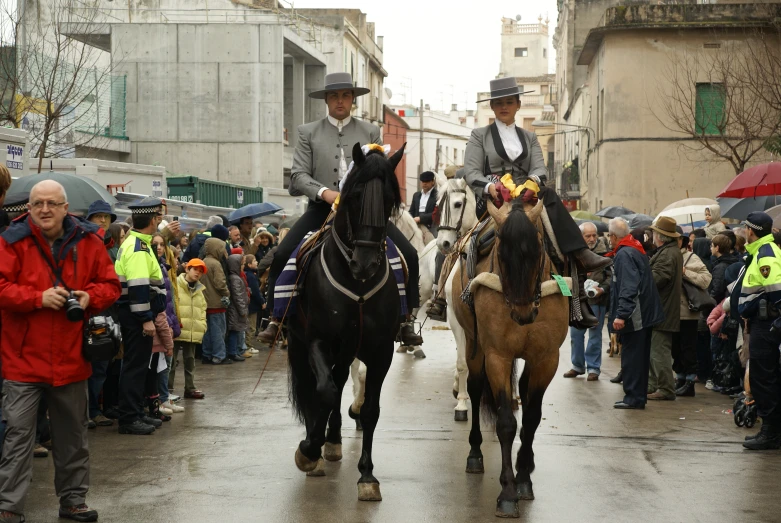 some people on horses in a parade