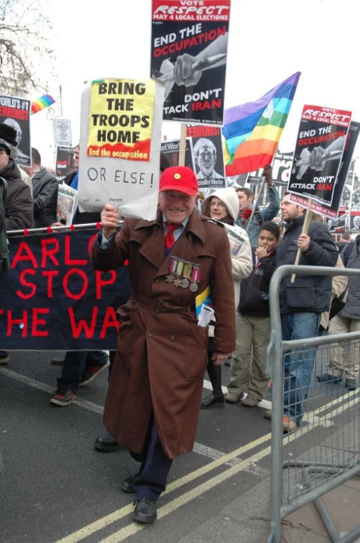 a group of people are protesting holding banners