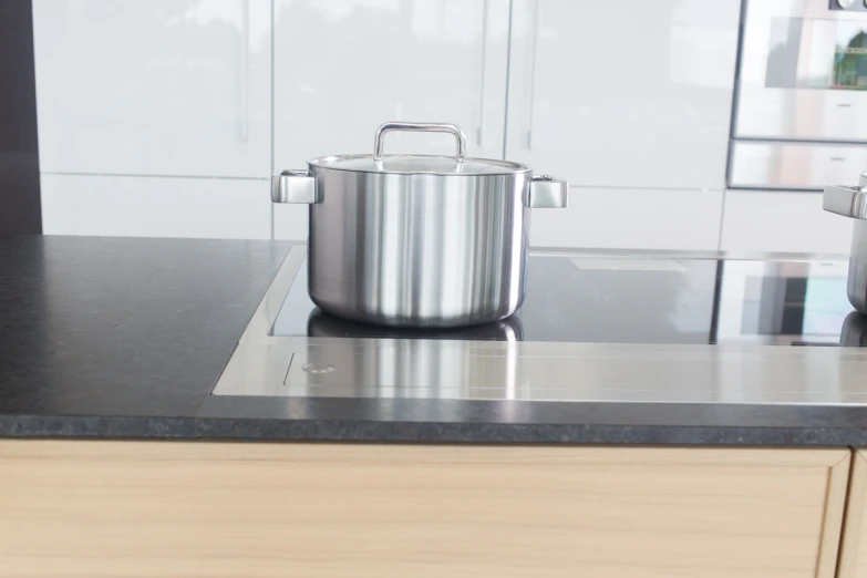 a pan on a counter that is on the stove