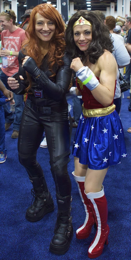 two woman dressed as wonder and wonder wonder