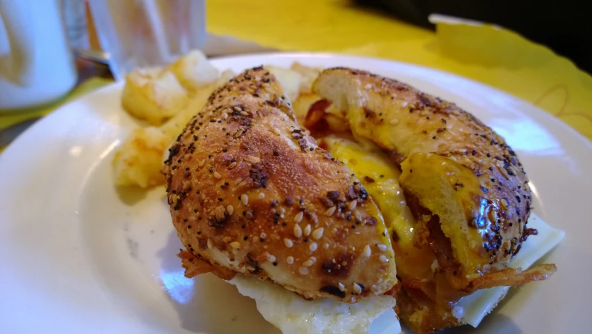 a close up of a plate with a sandwich