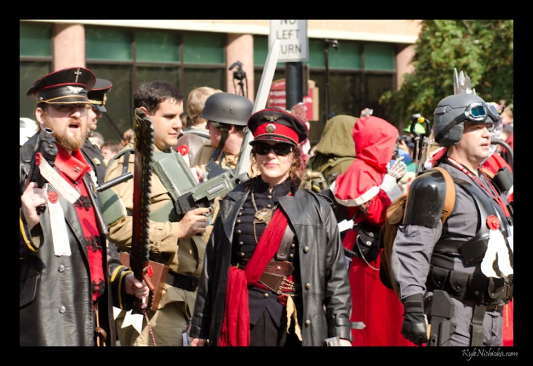 a group of people in costumes stand outside