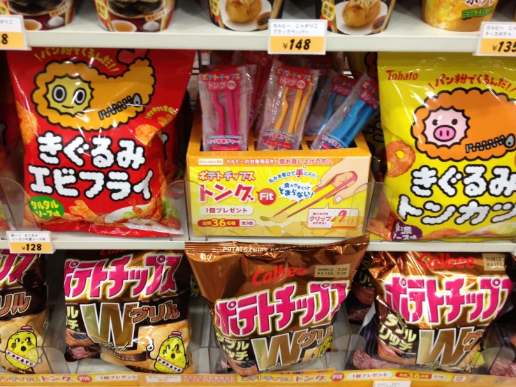 some assorted bags of snacks in a store