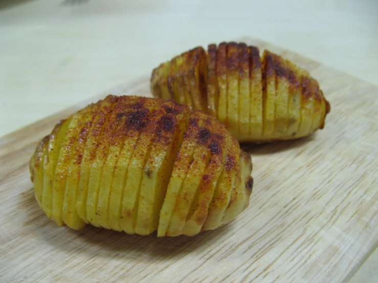 some kind of small, delicious looking treat sitting on a  board