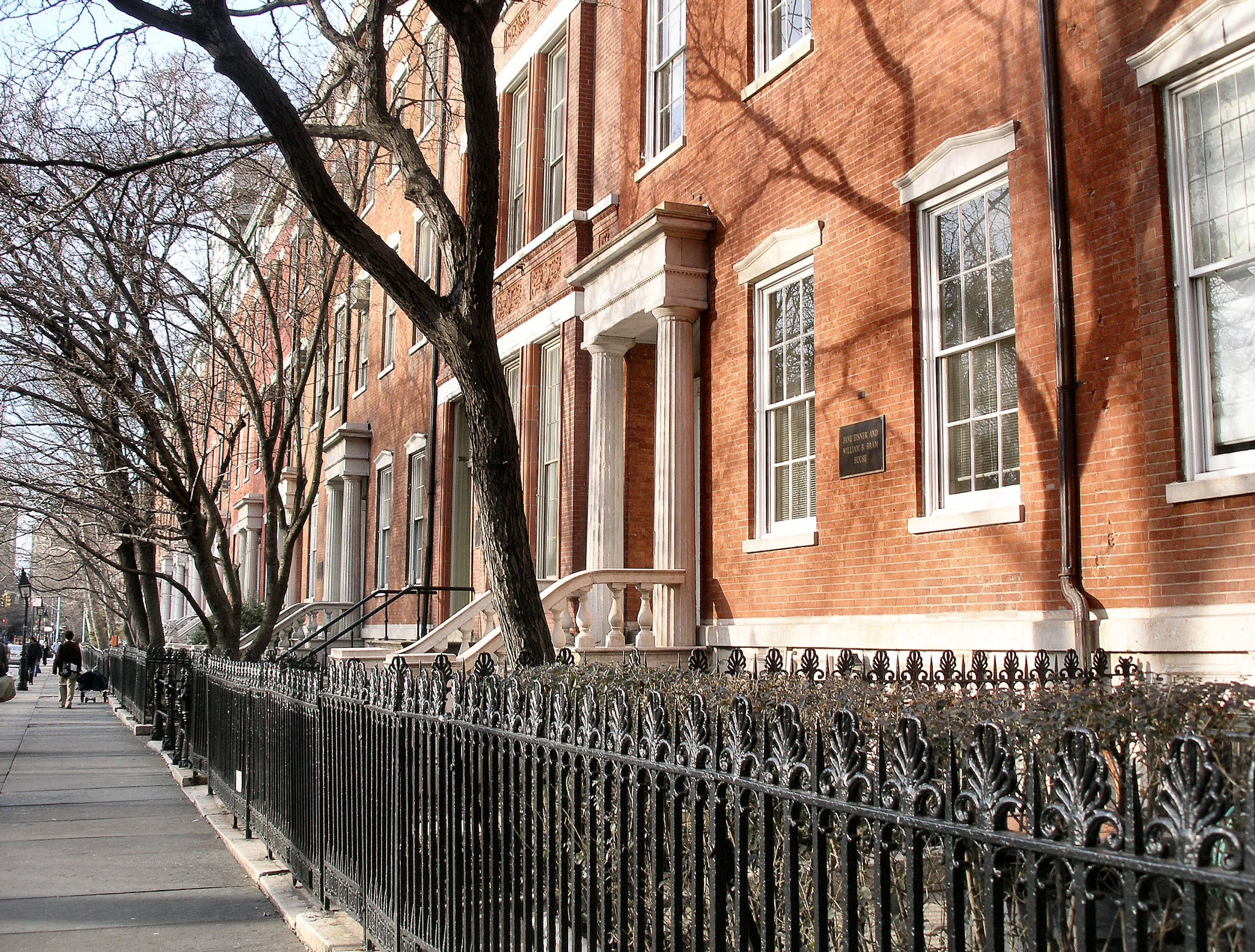 there are many brick buildings lined up on this street