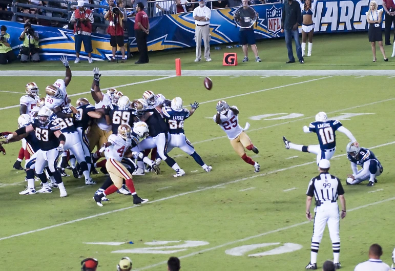 a group of young men playing a game of football