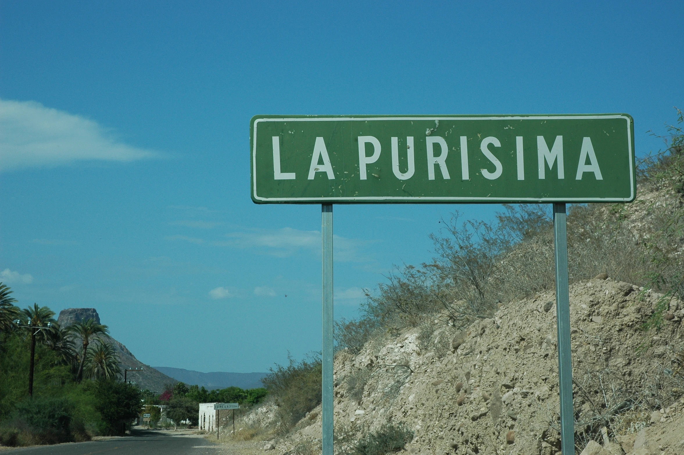 the sign states a city and the name is la purisisma