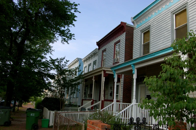 several different style houses are all lined up