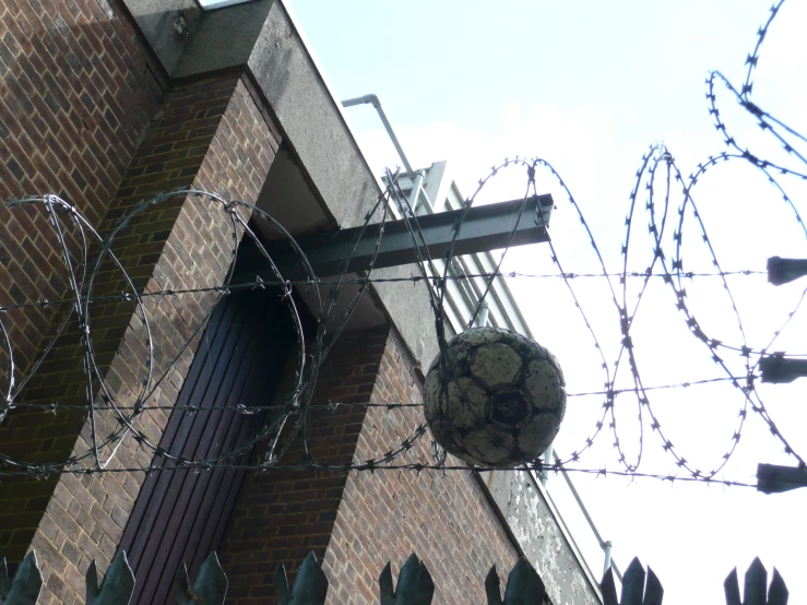 a large globe sitting inside a prison cell