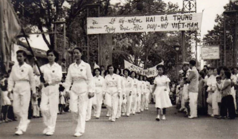 a group of people standing next to each other