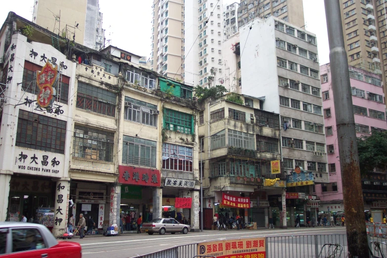 a street in an oriental city filled with tall buildings