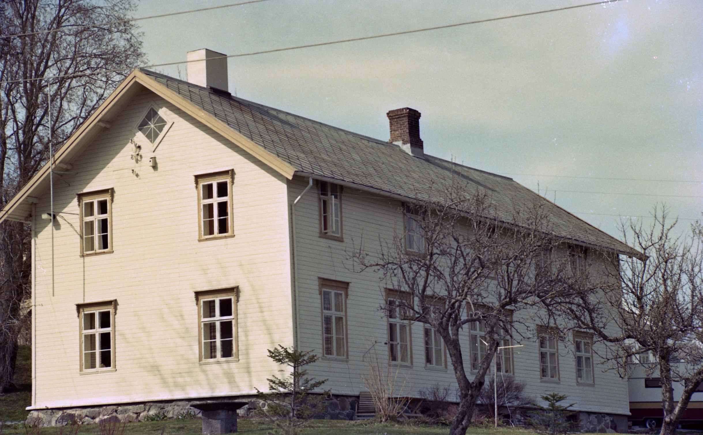 a white house on a street corner