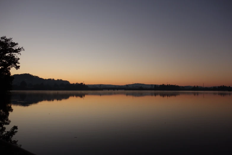 a lake that is empty of people and in the sunset