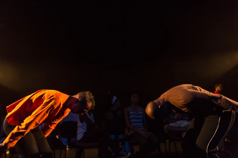 a couple of people are dancing on the stage