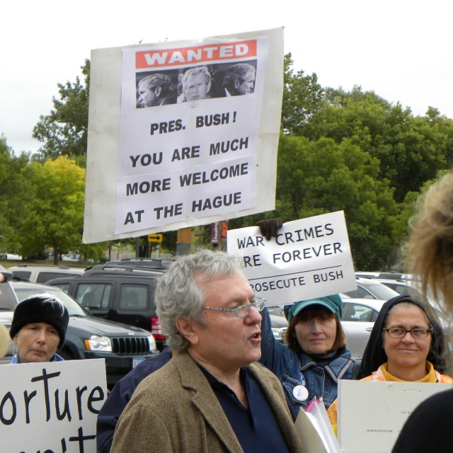 a group of people protesting at the same event