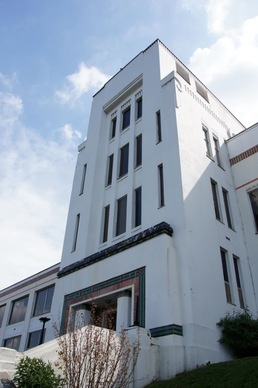 a large building with a clock tower on the corner