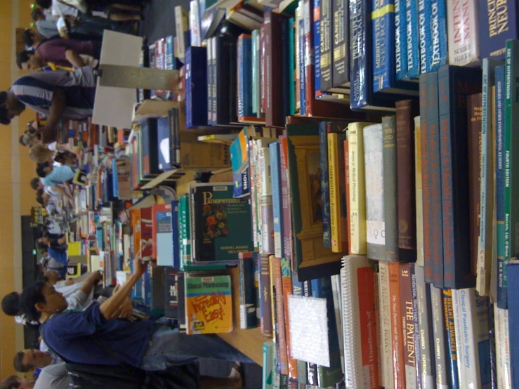 a row of books are sitting on a table