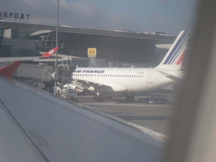 looking out an airplane window at the airport