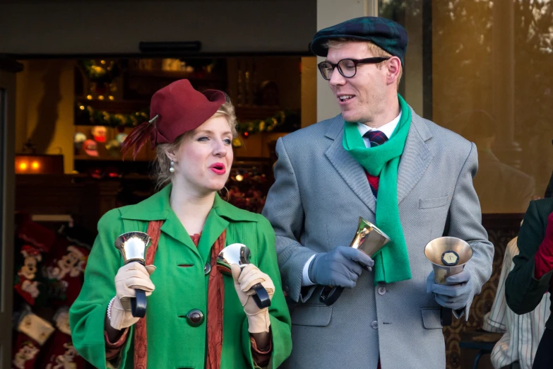 two people are dressed in costumes for christmas