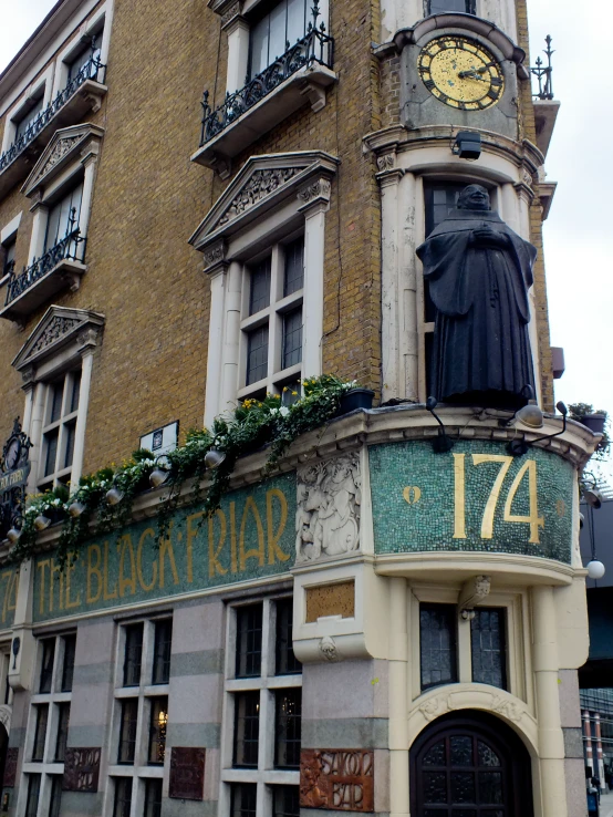 a statue that is on top of a building