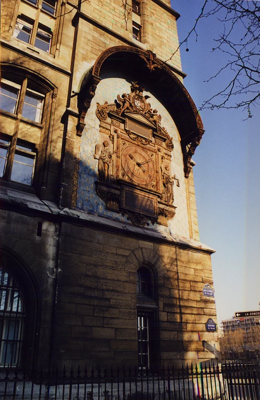 a picture of a building that looks like it has a large clock on it