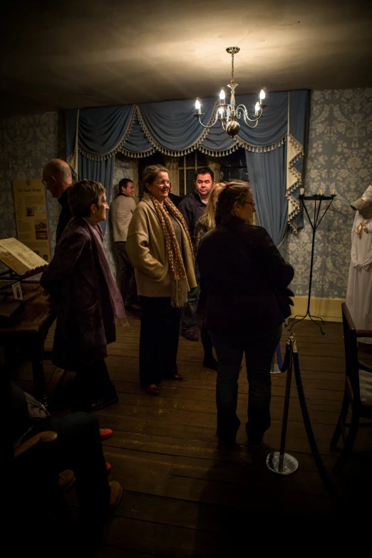 a group of people standing together in a room