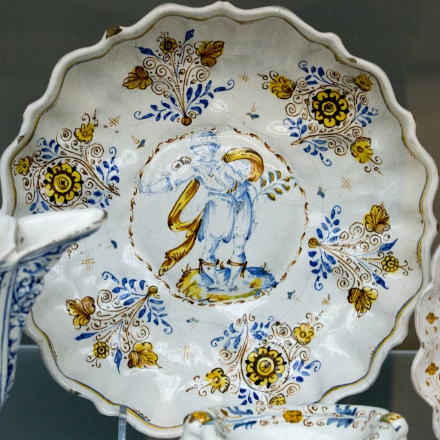 a close up of a fancy plate that has an elephant design