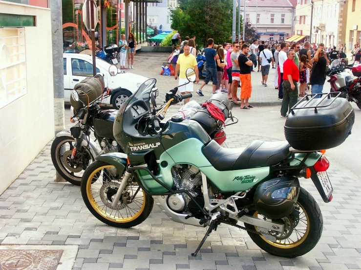 some very pretty motorcycles parked near one another